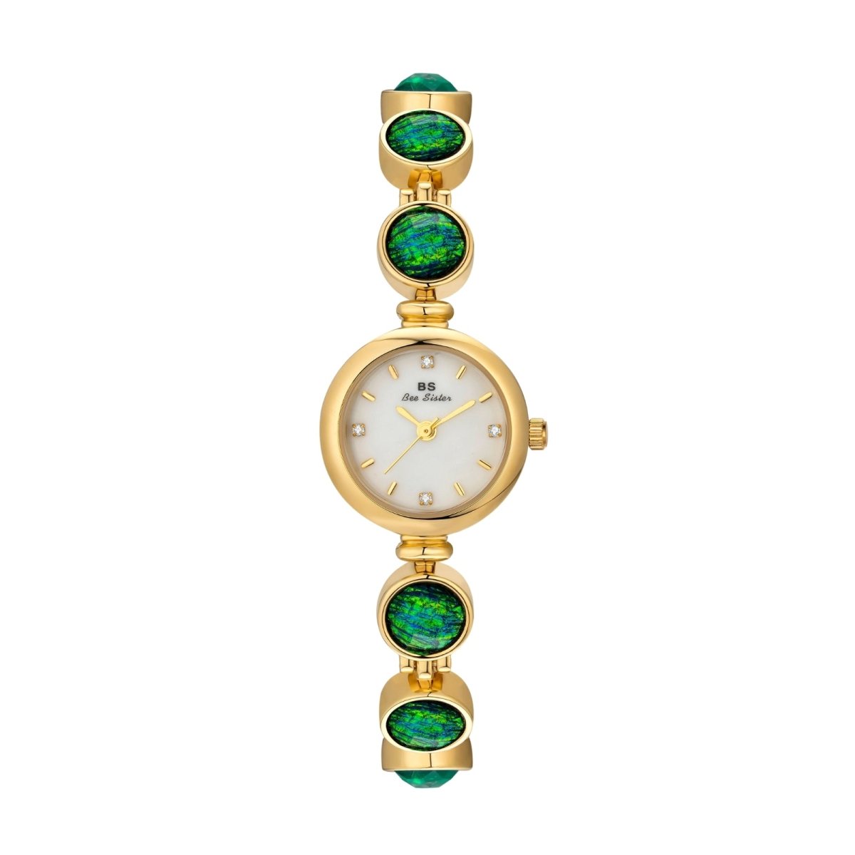 Gold kouvr watch with green gemstones on a white background