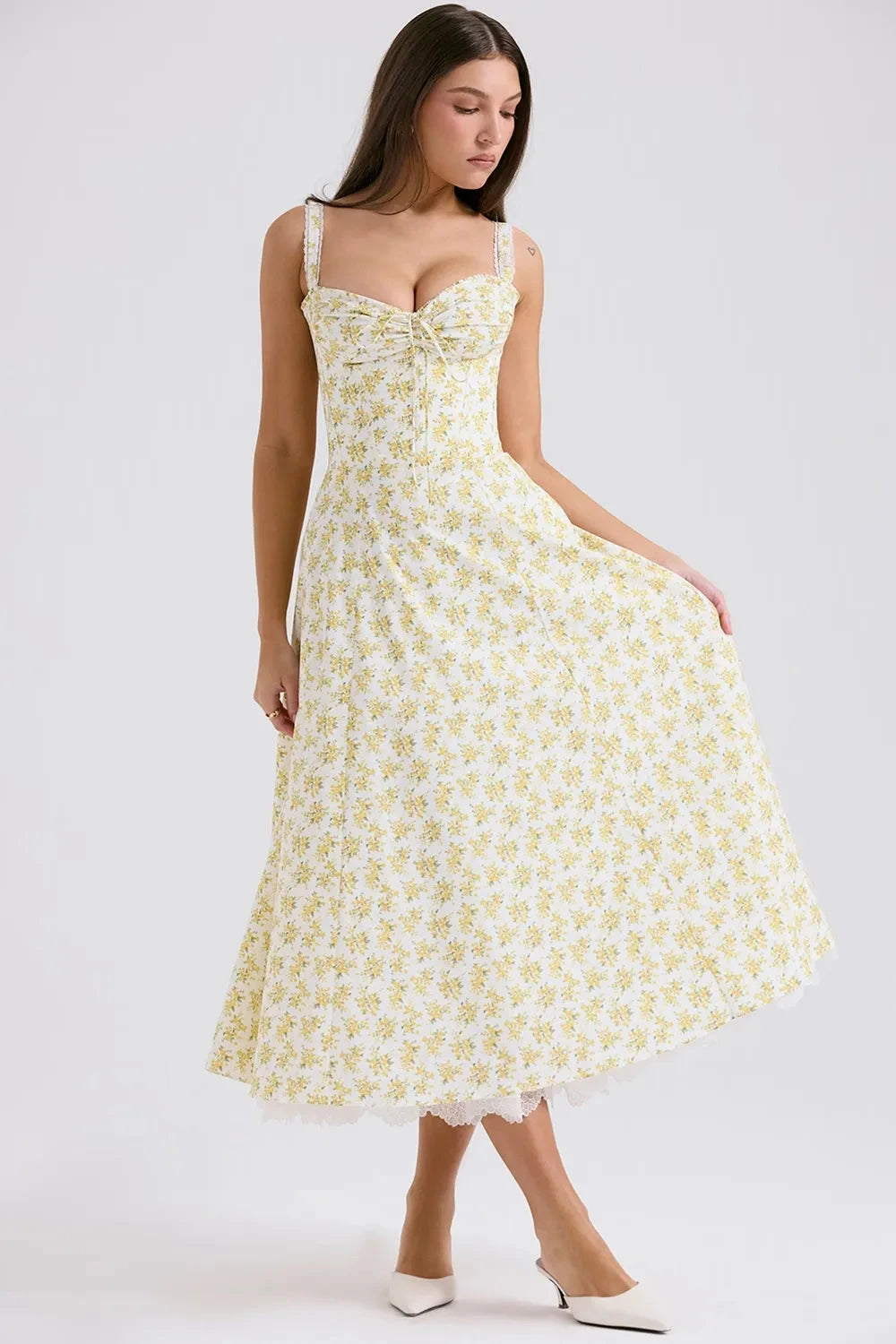 Kouvr's Helena yellow floral vintage-inspired midi dress with sweetheart neckline and pockets