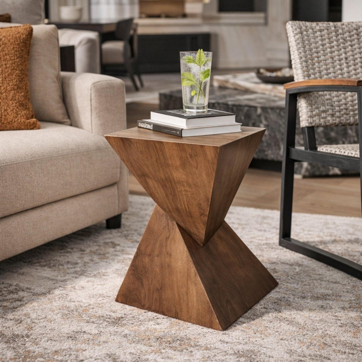 A diagram showing the dimensions of the Kouvr hourglass side table: 18.1 inches high and 12 inches wide, made from lightweight concrete in a natural wood color.