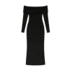 Model from behind wearing Kouvr Ingrid black ribbed knit off the shoulder maxi dress