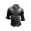 Man wearing the Kouvr Jackson slim fit black denim shirt with rolled sleeves