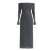 Model wearing Kouvr Jada long sleeve off-the-shoulder evening gown in gray
