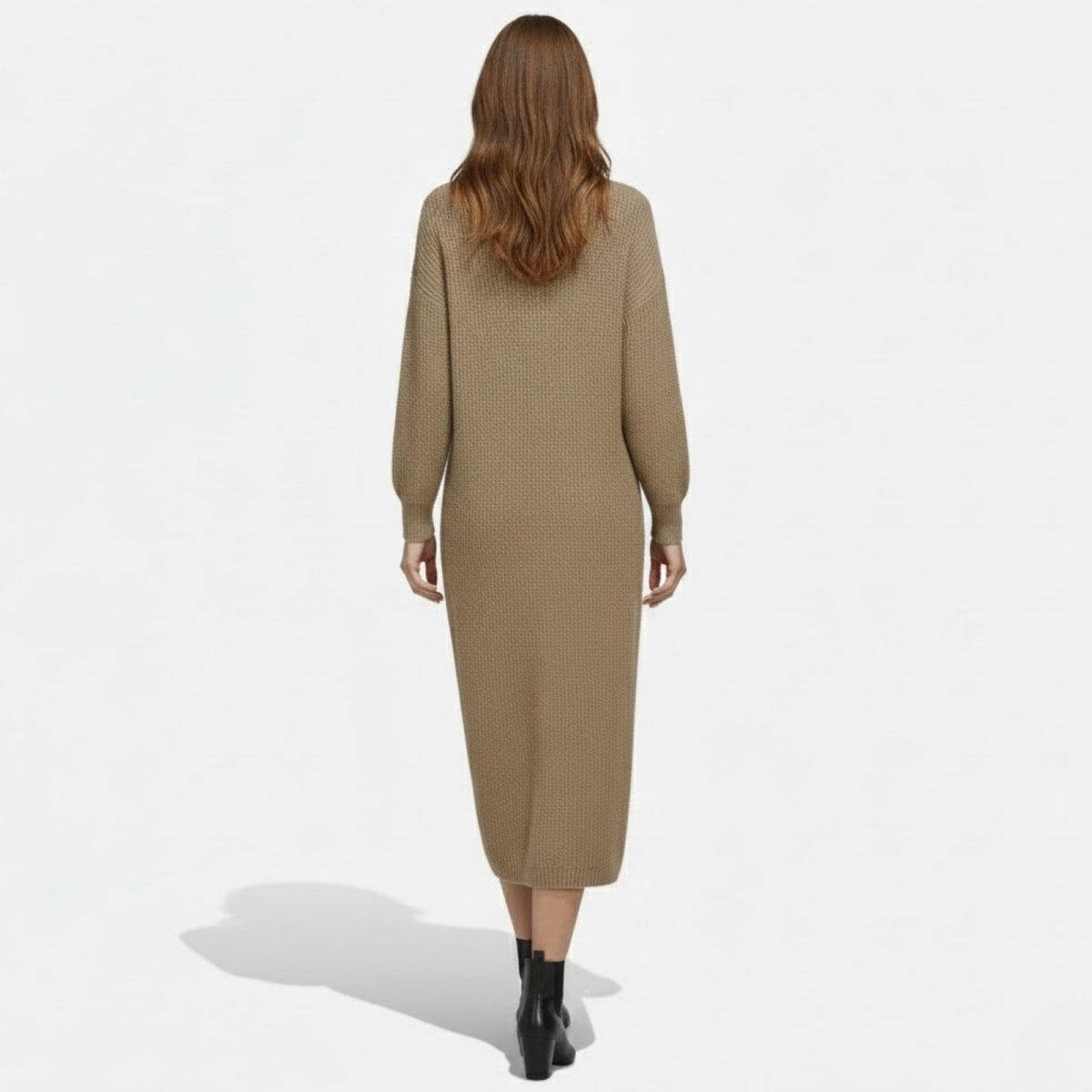 Back view of a model wearing the Kouvr Janessa khaki knit midi dress, showing the full length and sleeve style.