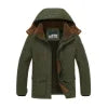 Front view of Kouvr men's green sherpa lined winter parka with hood up