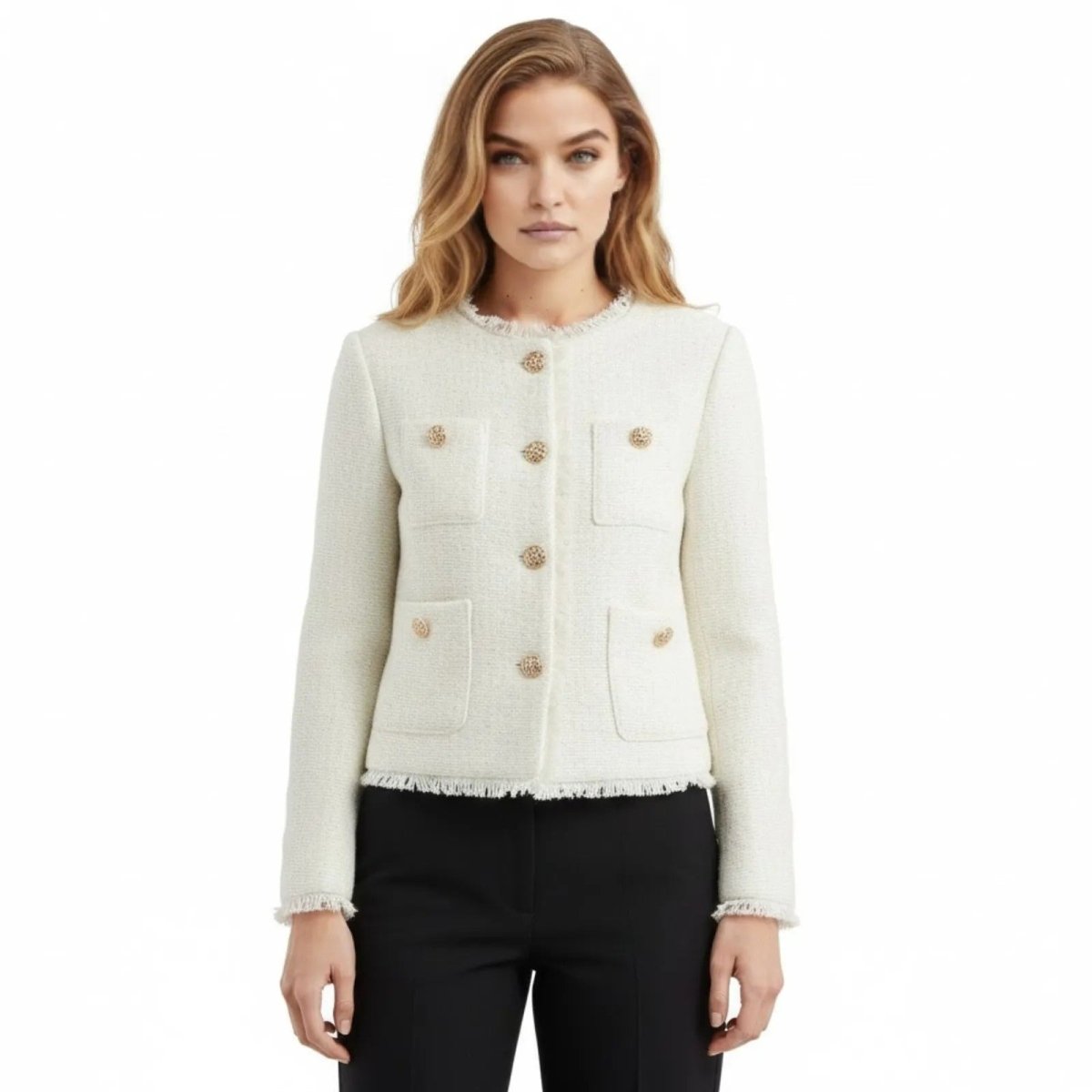 Model wearing the Kouvr Jelani white tweed jacket with gold buttons, styled with black trousers.