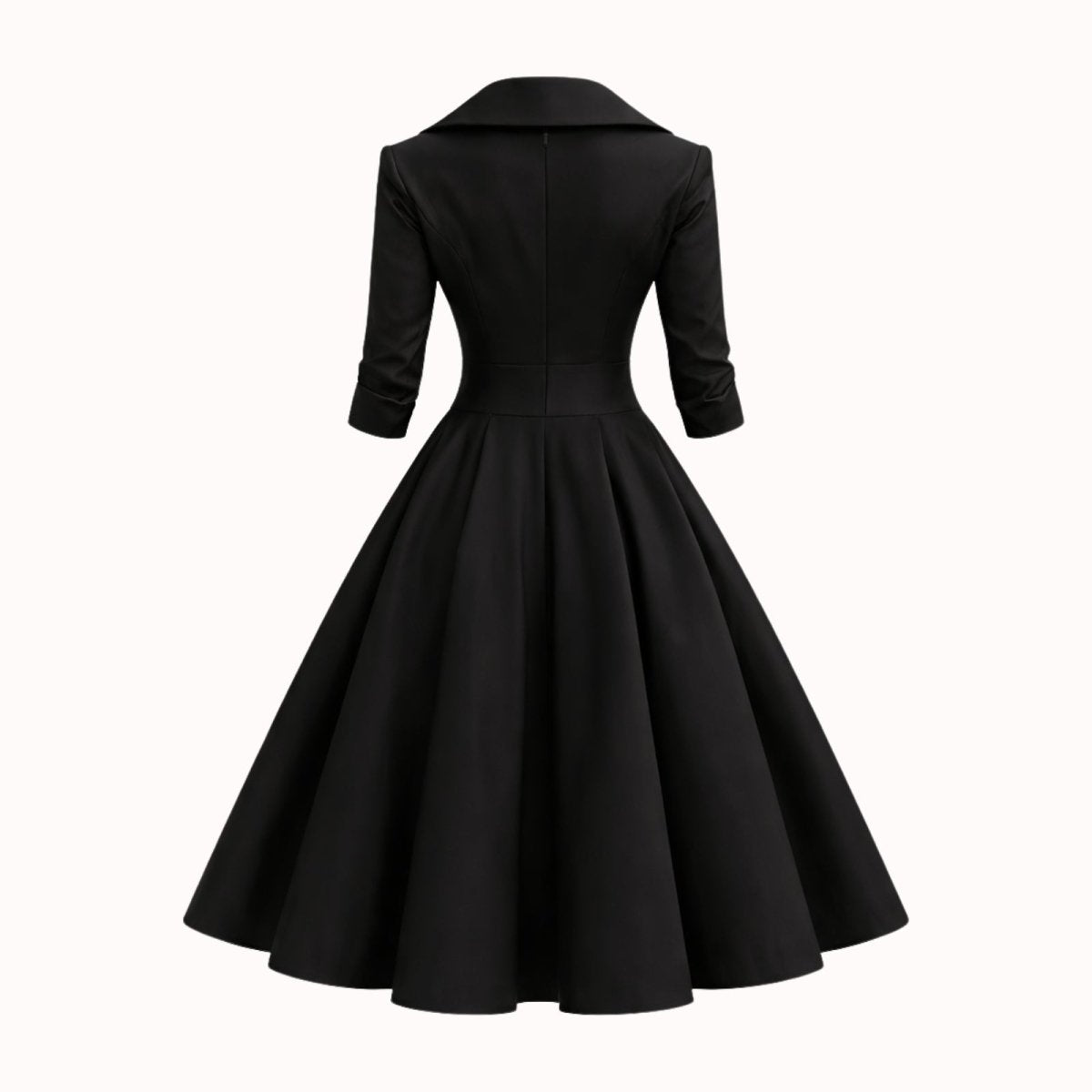 Product-only photo showing the back of the Kouvr Jenner black A-line dress, highlighting the structured waist and sleeve cuffs.