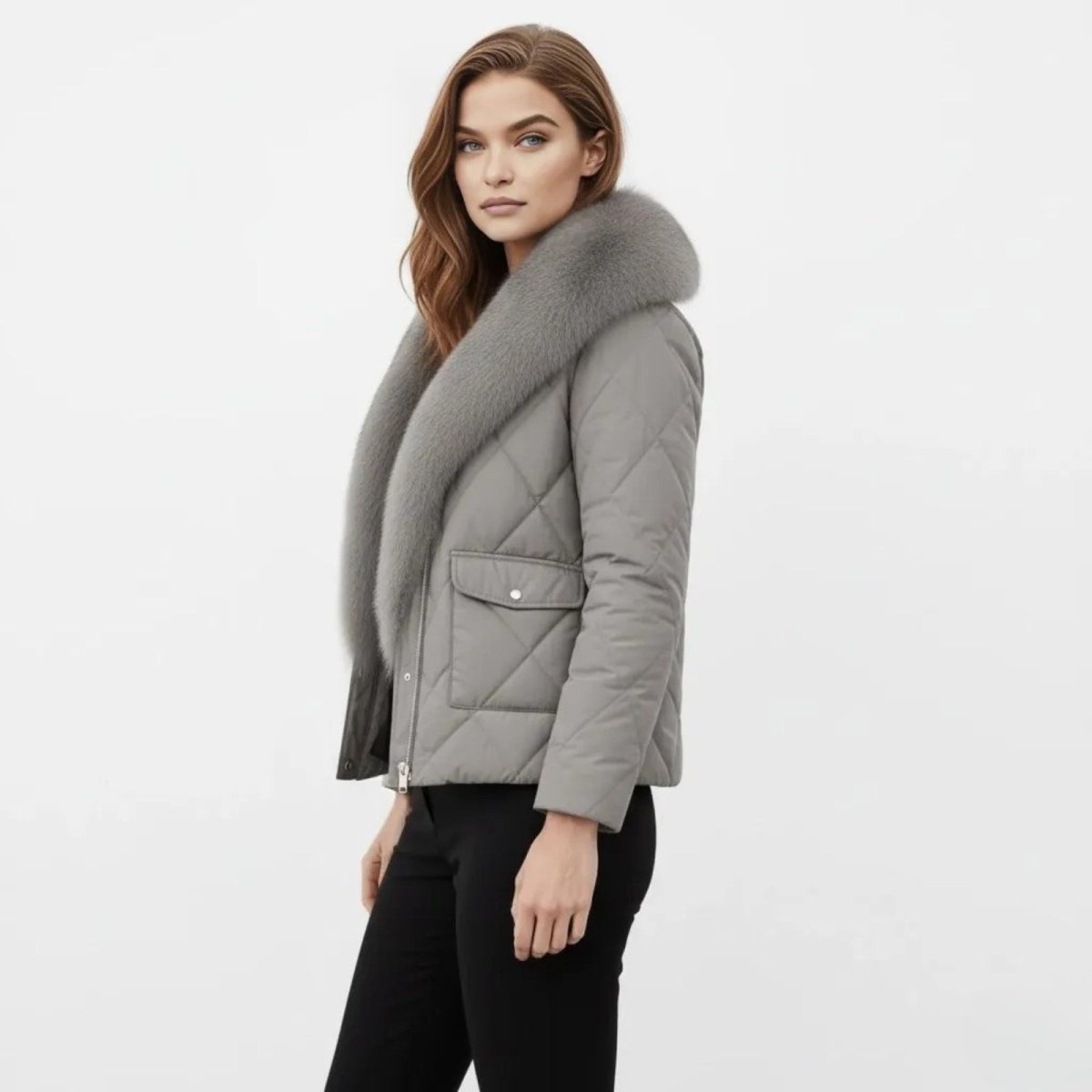 Side profile of a woman in a grey diamond-quilted jacket featuring a plush fur collar and flap pockets.