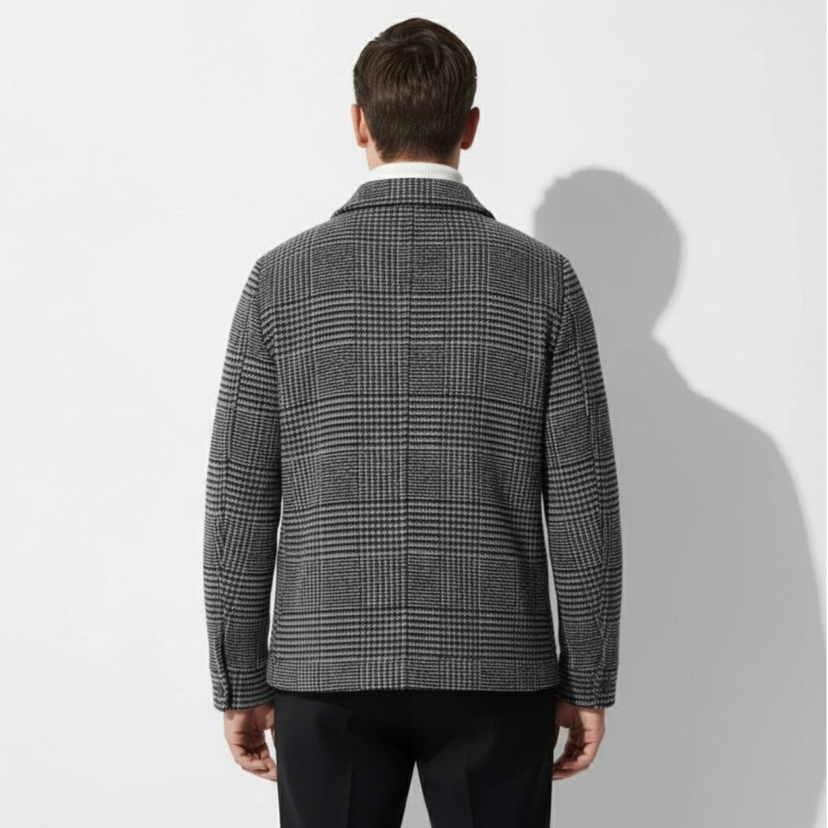 Back view of the Kouvr Kensington men's designer plaid overshirt, displaying the clean lines and continuous pattern.