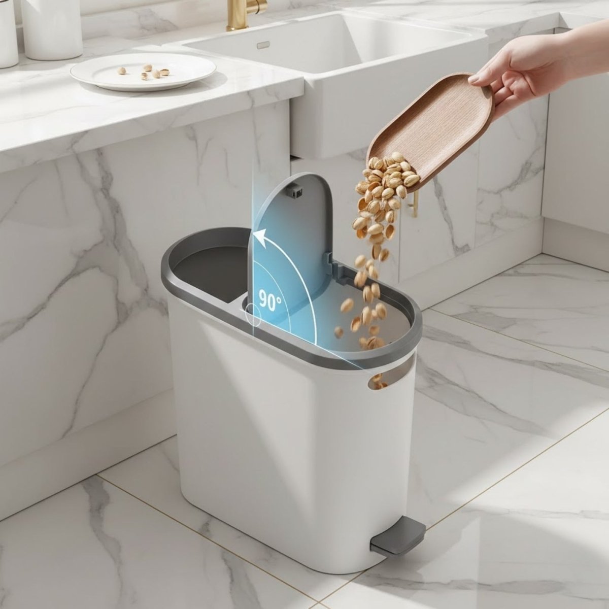 A slim Kouvr trash can in a kitchen setting with its lid open, demonstrating an alternate foot pedal model.