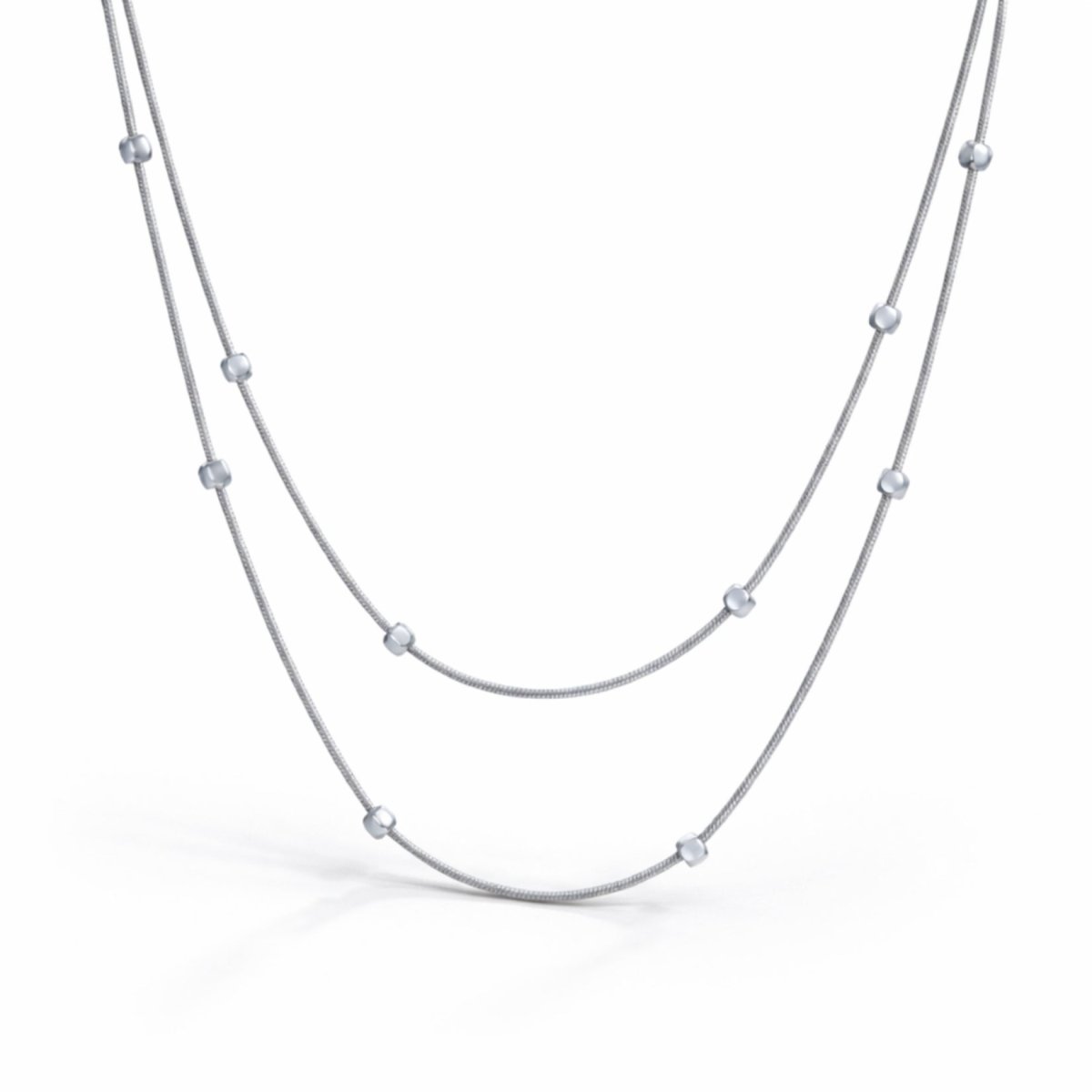 Kouvr double layered silver station necklace with polished beads on a clean white background.