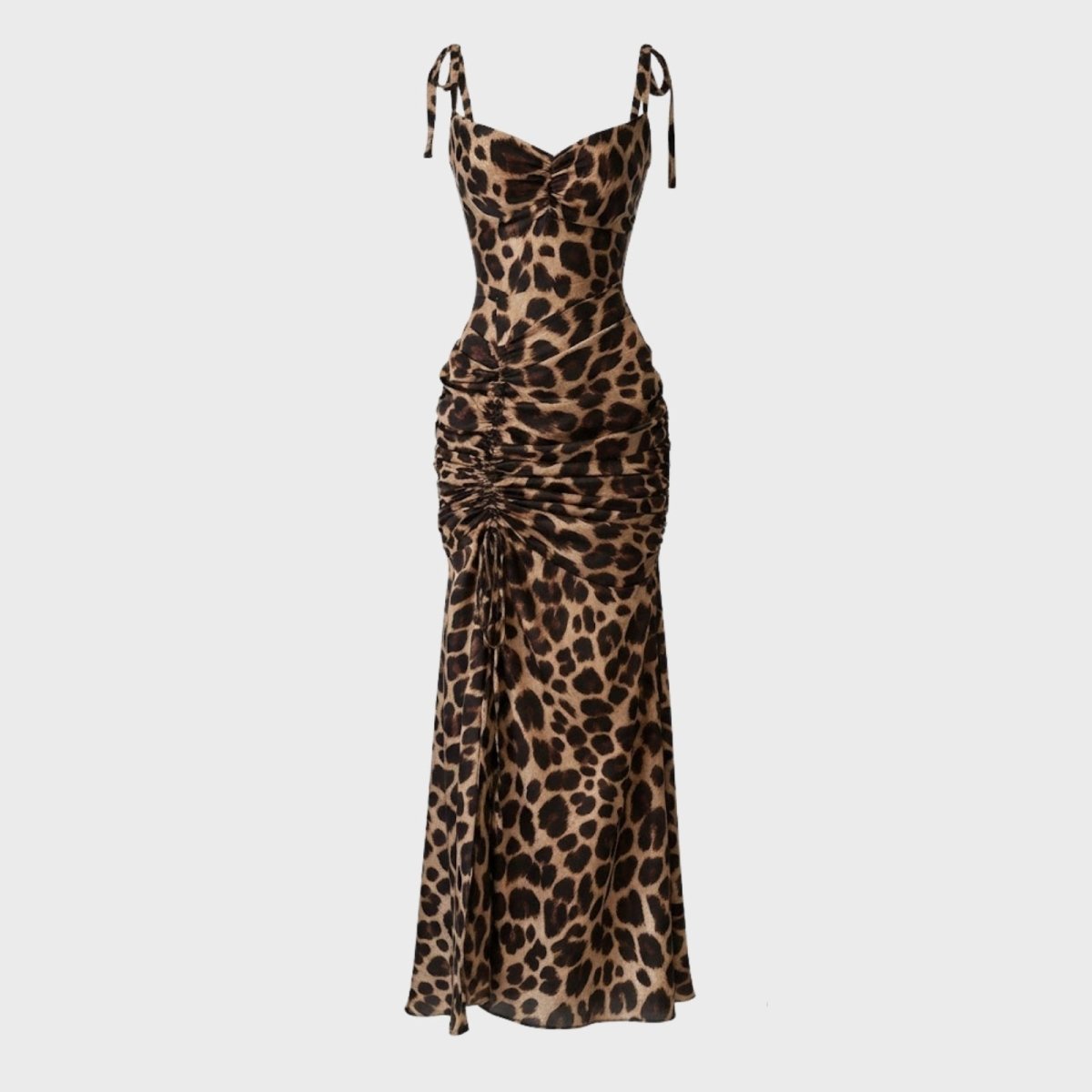 Flat lay image of a leopard print maxi dress showing the front, with details of the sweetheart neckline, tie straps, and drawstring ruching.