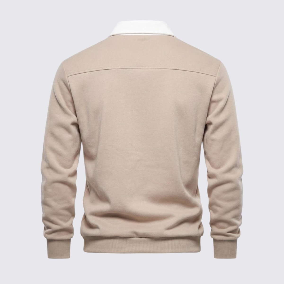 Flatlay of the back of the Kouvr men's polo sweater, showing the clean design and horizontal yoke seam.