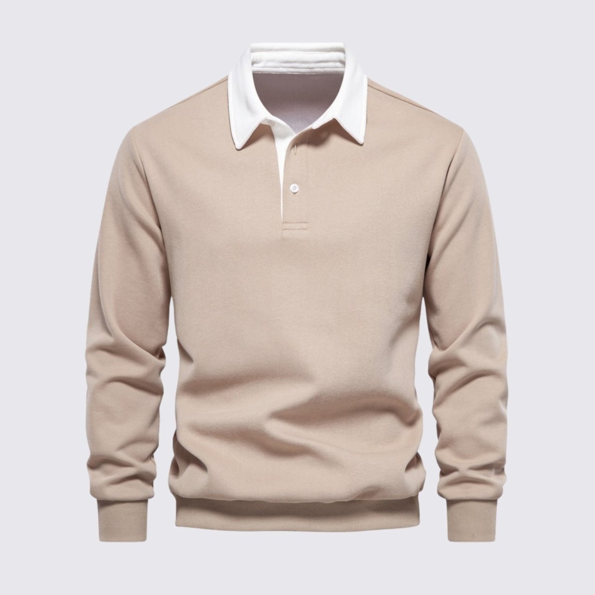 Flatlay product shot of the Kouvr men's long sleeve polo in light beige, detailing the white collar, placket, and knit texture.