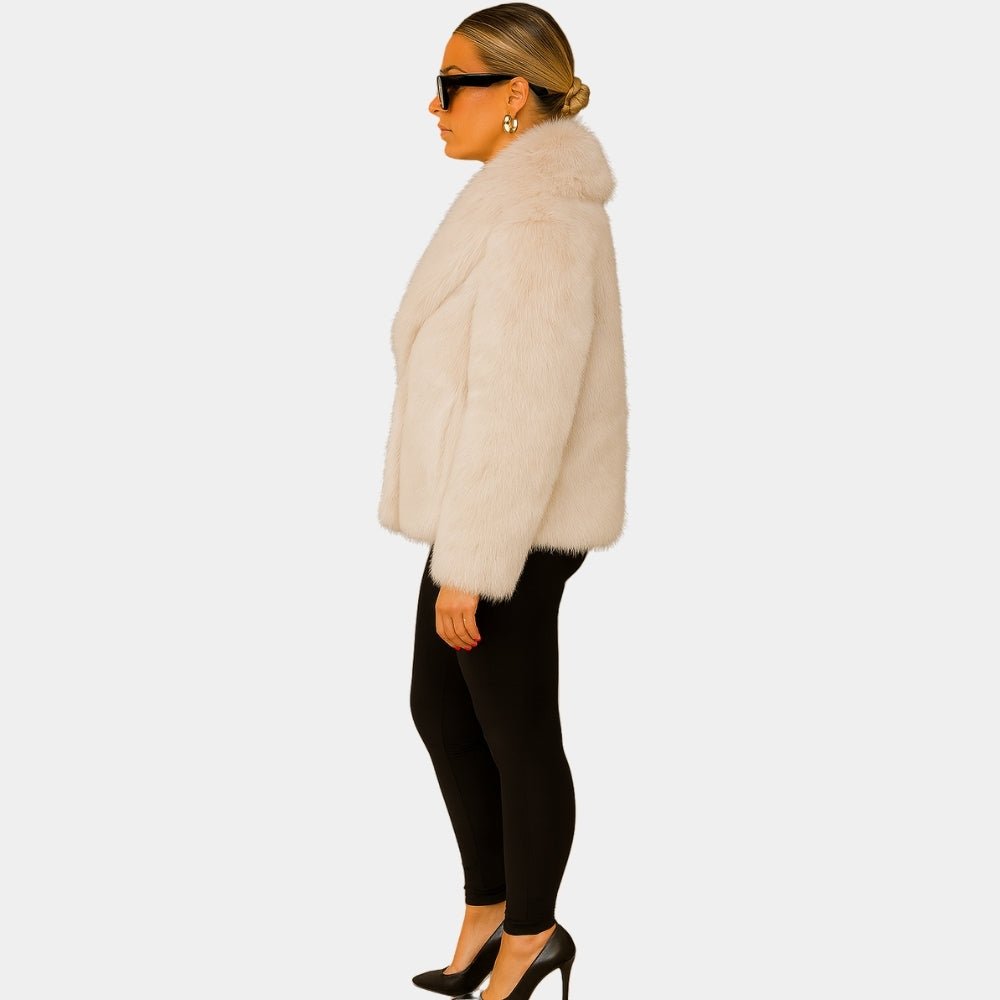 plush statement coat," "eco-friendly luxury outerwear," "winter wedding guest coat," "holiday party jacket," and "cruelty-free fur.