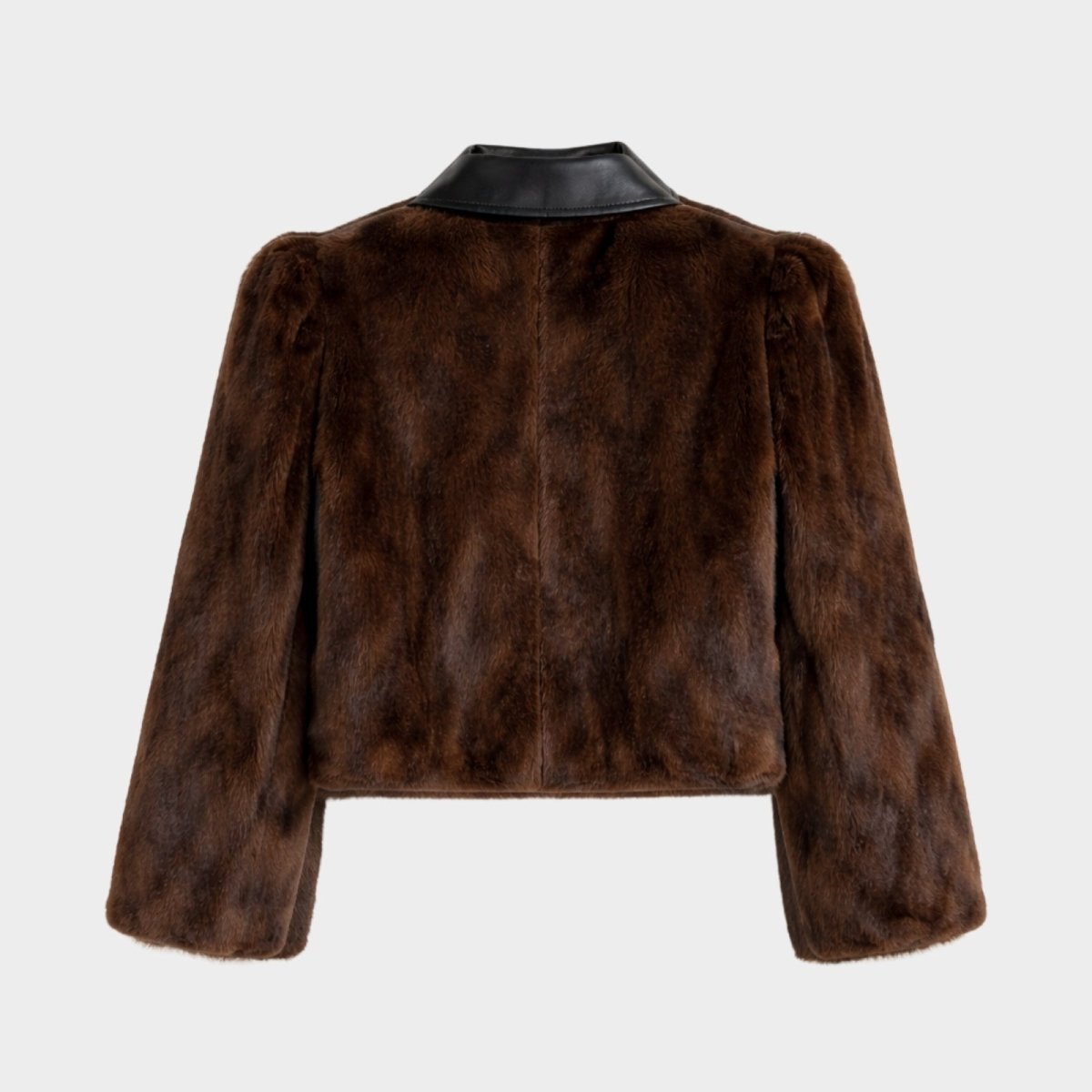 Detailed back view of the black leather collar contrasting against the rich chocolate brown faux fur texture of the Kouvr jacket.
