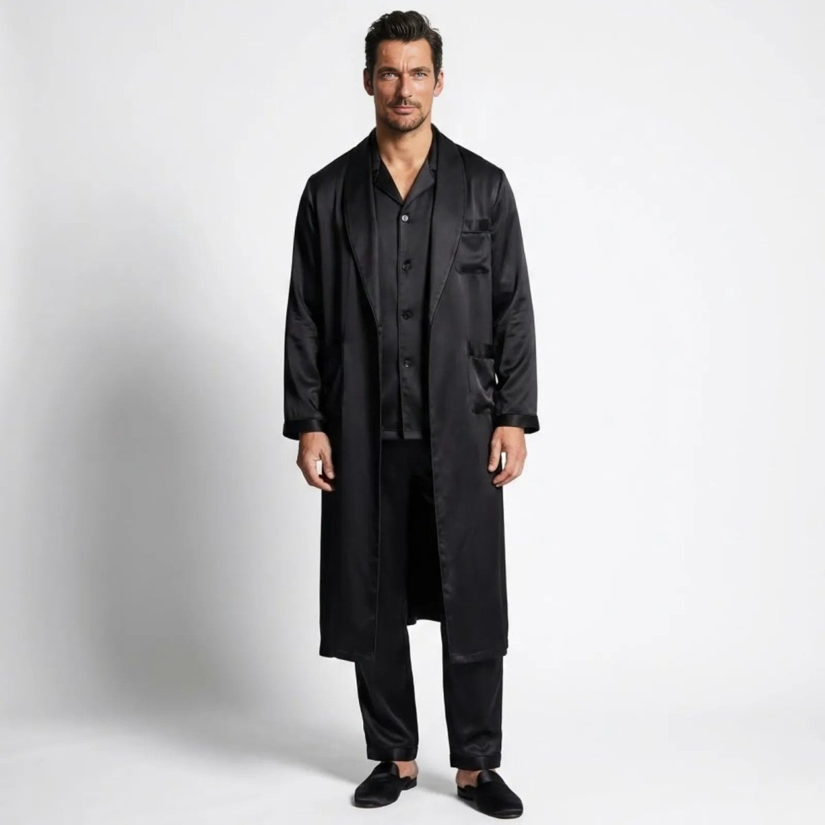 Man wearing the Kouvr Noir Silk 3-Piece Pajama and Robe Set, facing forward against a white background.
