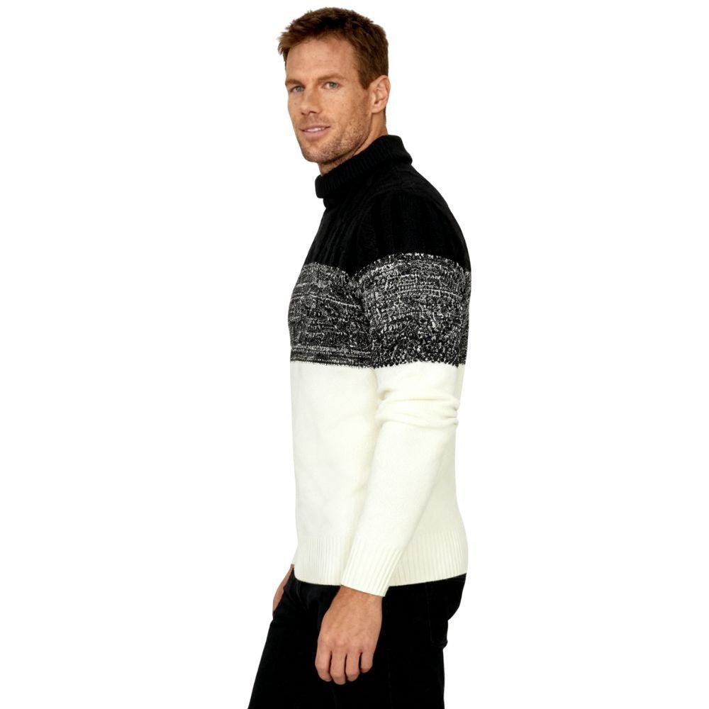 Man wearing a black and white kouvr sweater with a sequined pattern on a white background