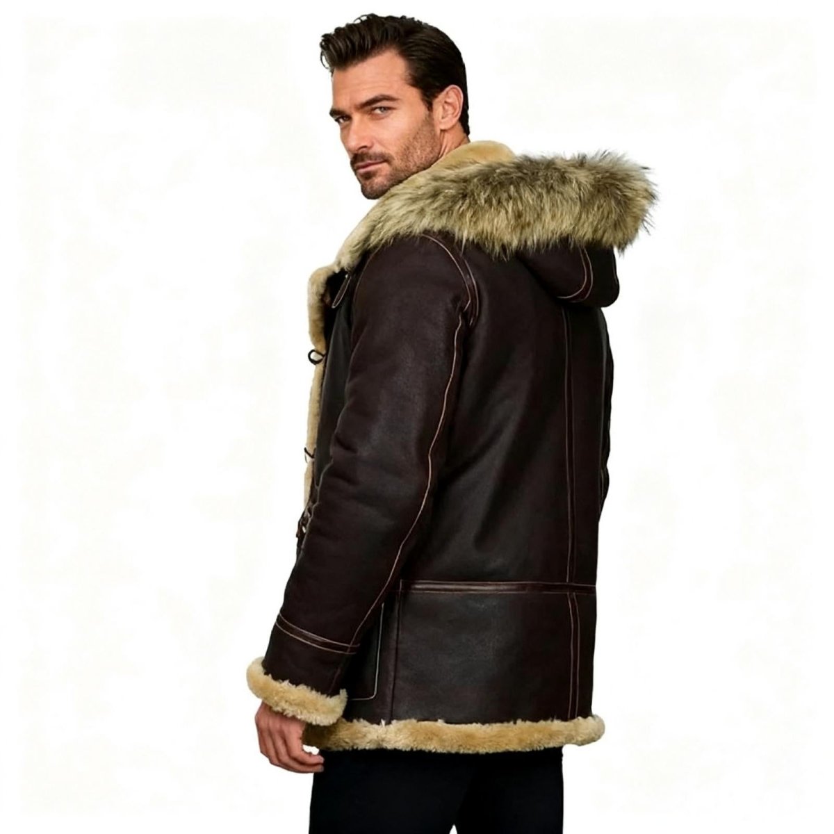 Side view of men's brown winter jacket showing hood construction and leather seams.