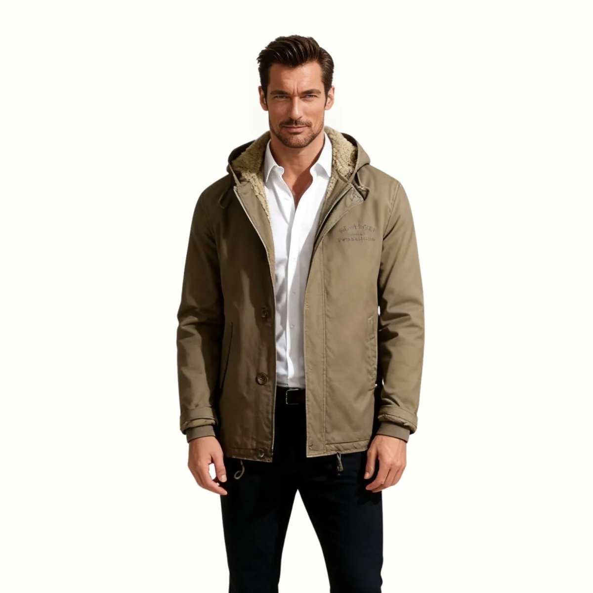 Model wearing the Kouvr men's sherpa-lined hooded parka in khaki drab, styled over a white collared shirt for a smart casual look.