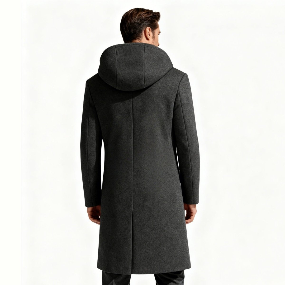Back view of a man in a modern urban pea coat with a hood, showing the slim silhouette and pocket detail.