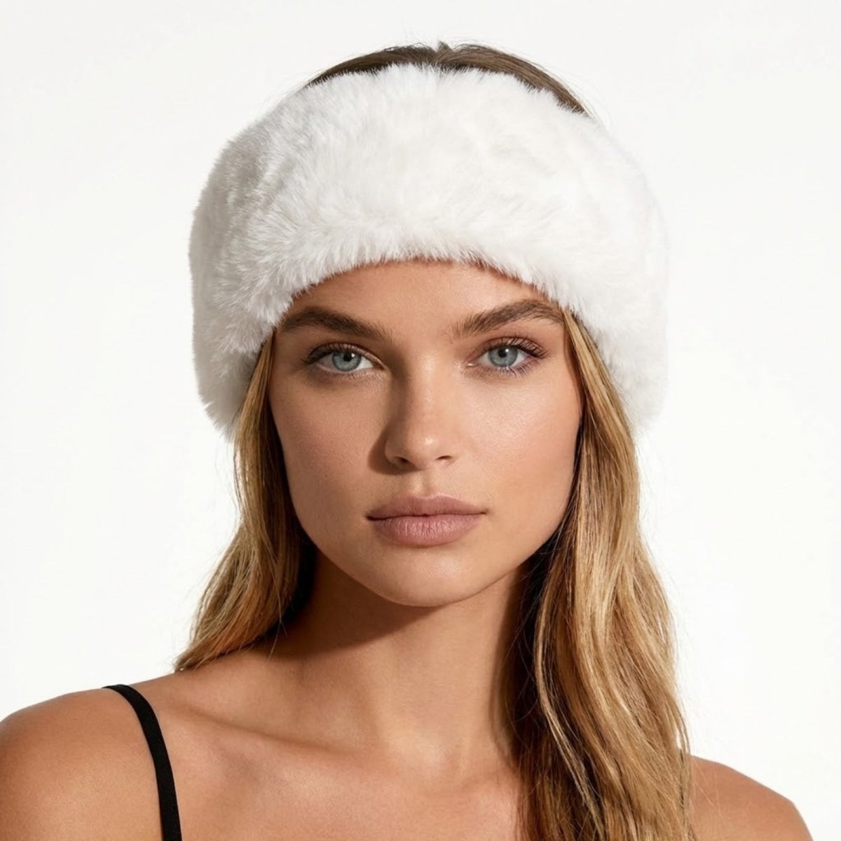 Model looking forward wearing the Kouvr Nancie luxe white faux fur headband