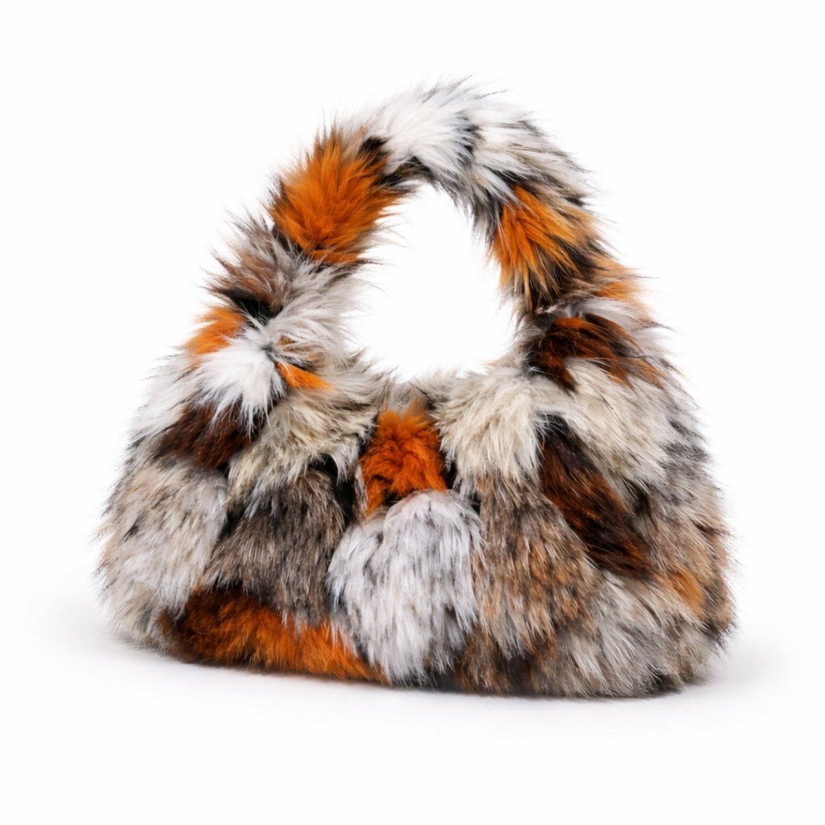 Kouvr Nerrisa faux fur hobo bag with orange, white, and brown patchwork on a clean white background.