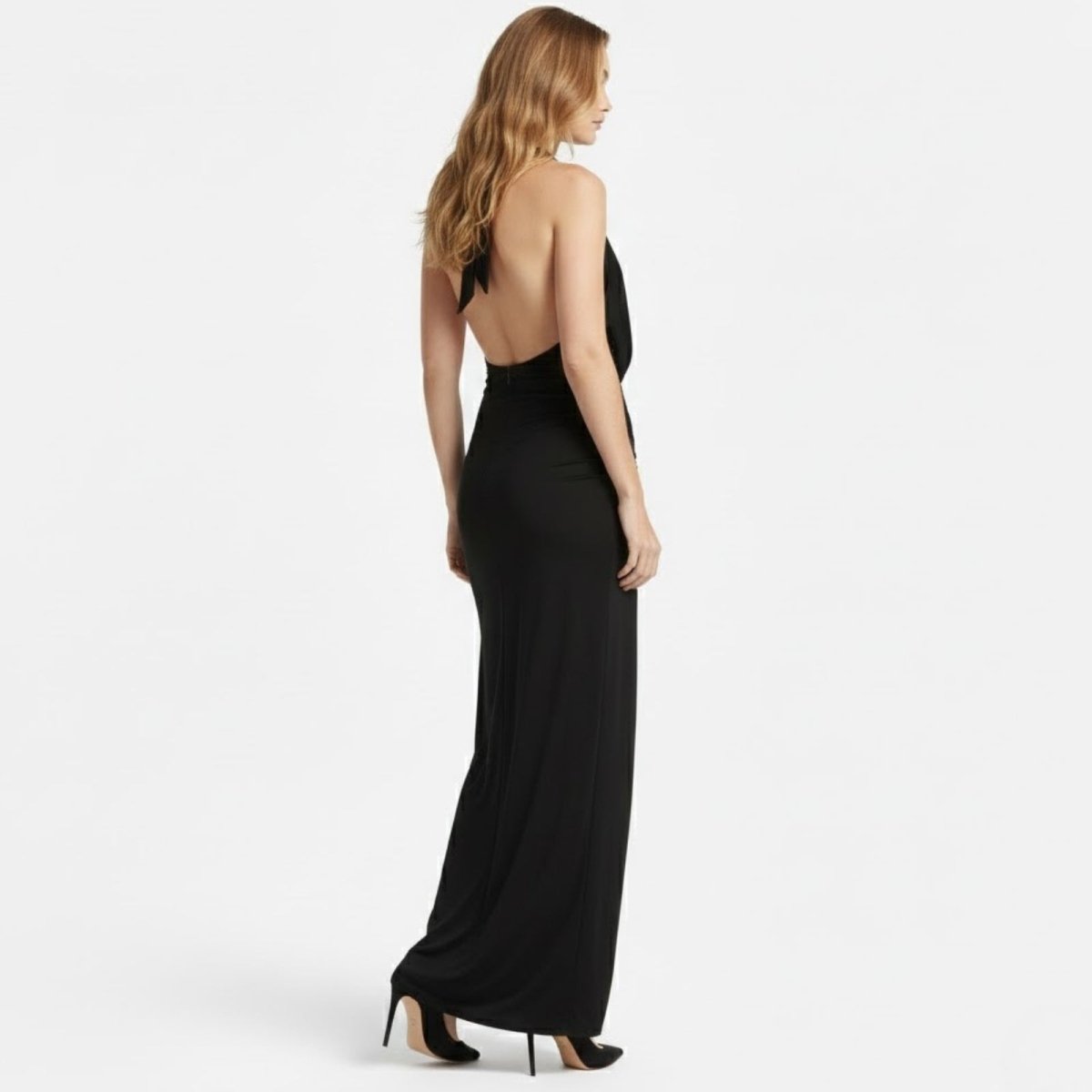 Back view of the Kouvr Fashion Nina gown showing the open back and halter neck tie detail.