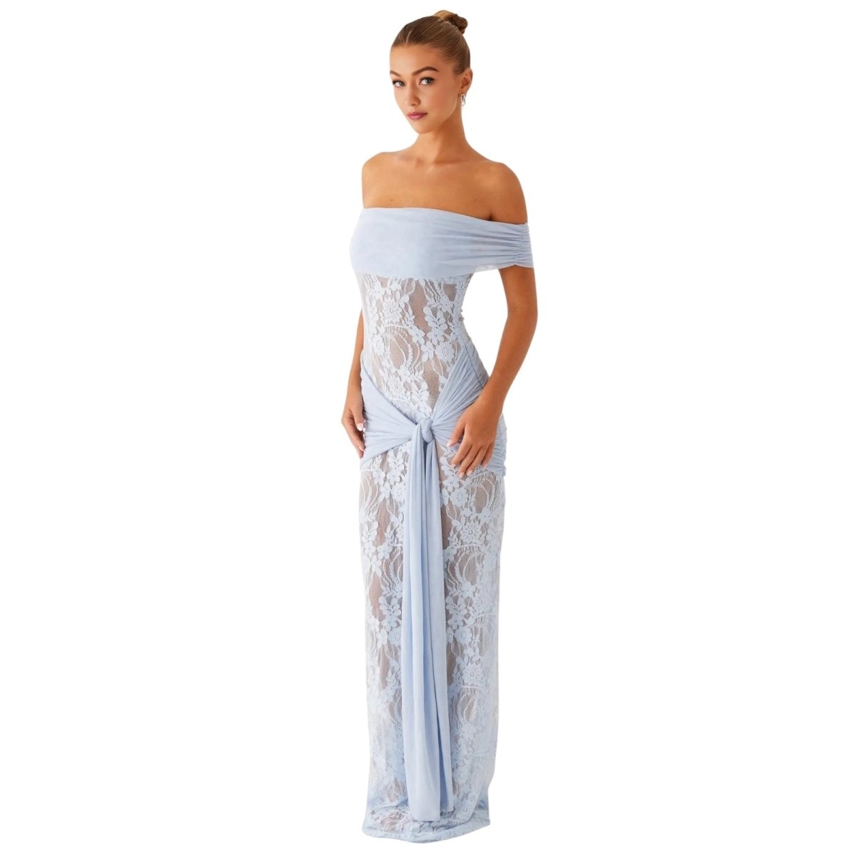 Woman wearing a light blue Kouvr off-shoulder lace gown on a white background