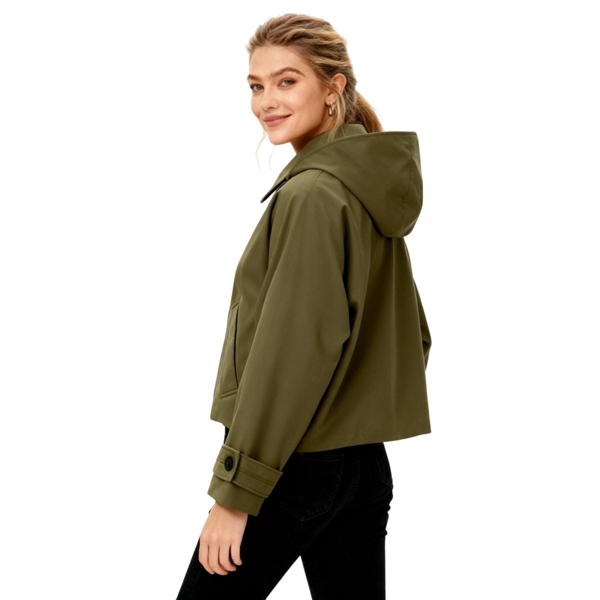 woman styling the Kouvr army green lilibeth jacket with black pants .