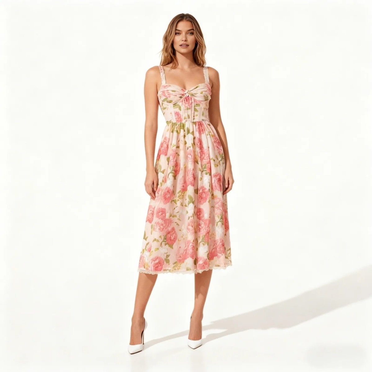 Model wearing the Kouvr Fashion pink midi dress with sweetheart neckline, shown from the front against a white background. 