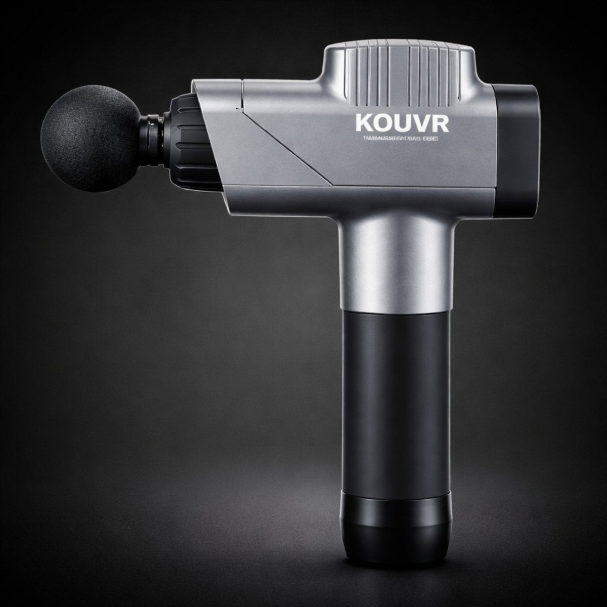 Kouvr premium deep tissue massage gun in silver and black side profile