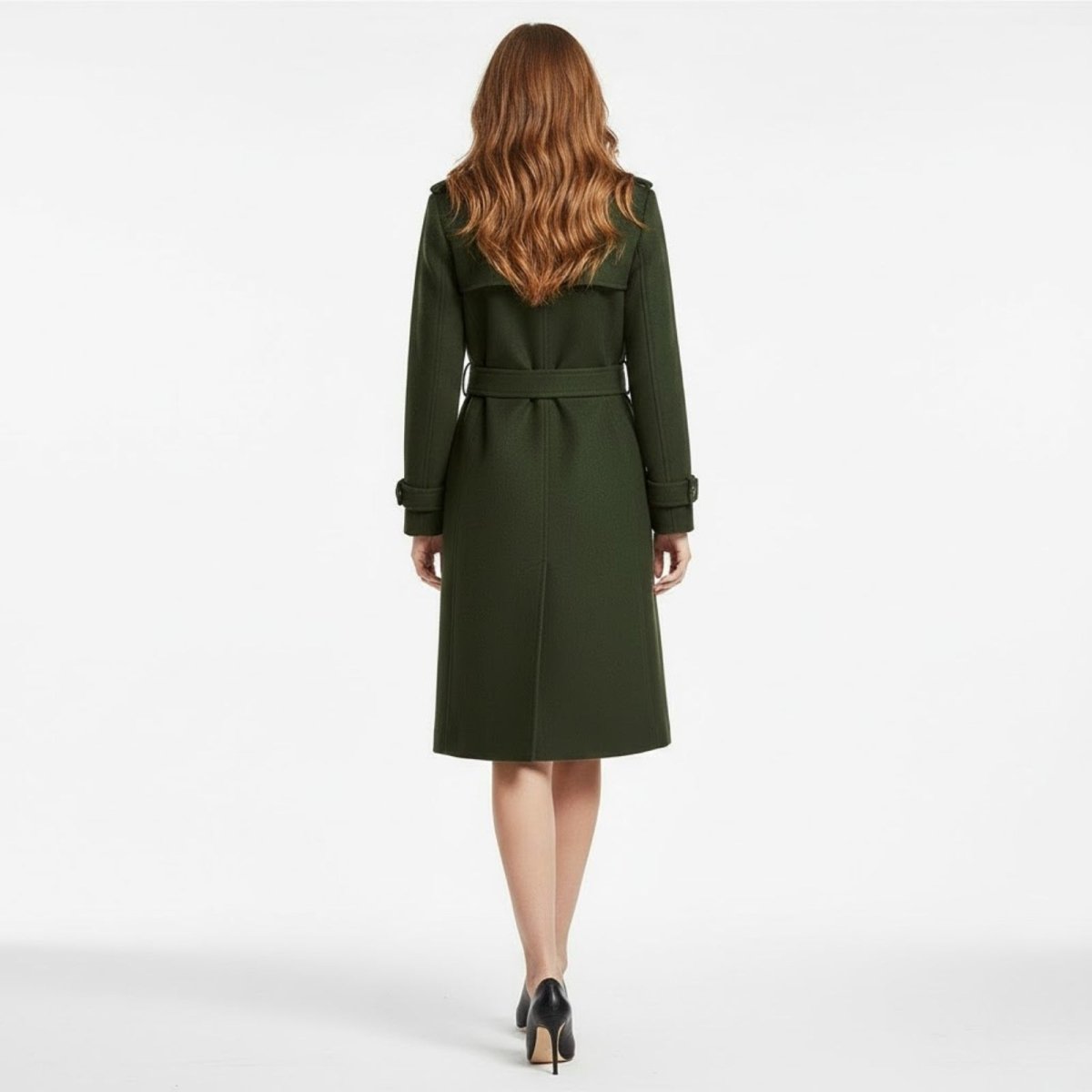 Back view of the Kouvr Rachelle women's belted wool trench coat, highlighting the storm flap and waist-cinching belt detail.