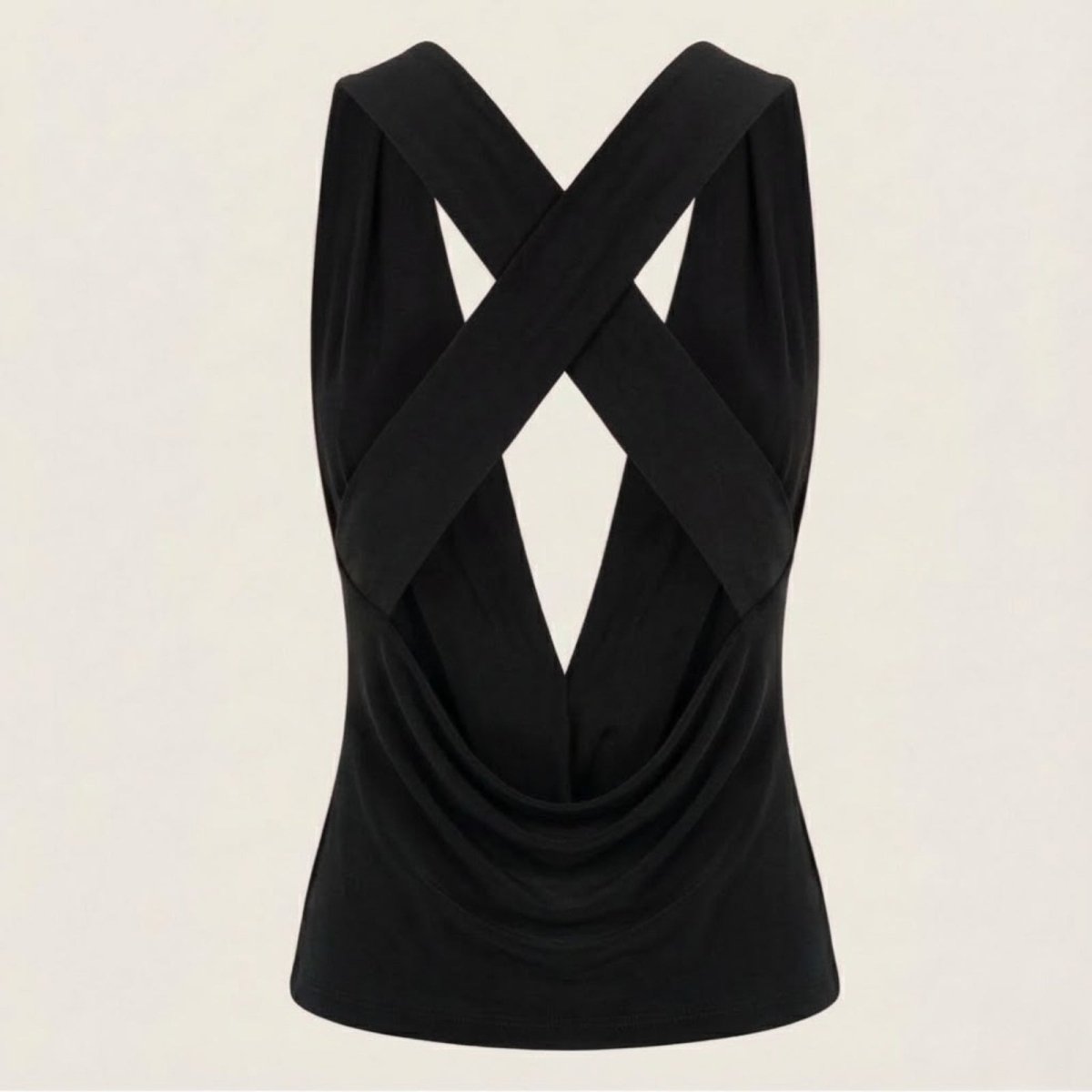 Product flat lay of the back of the Kouvr Rhea top, highlighting the construction of the criss-cross straps and low draped back.