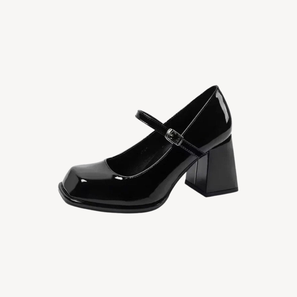 Side profile of the Kouvr Sabrina in high-gloss black patent, showcasing the chunky block heel, adjustable ankle strap, and modern square toe.