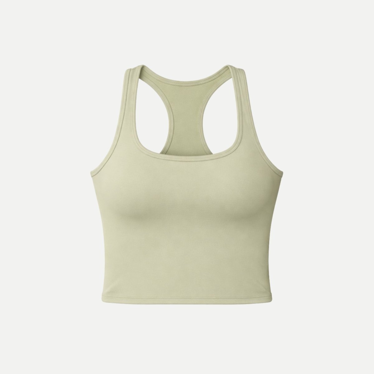 Flat lay front view of Kouvr luxury sage green scoop neck racerback activewear crop top with premium matte finish.