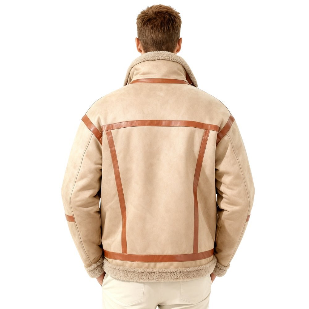 Man wearing a beige Kouvr leather jacket with brown accents on a white background