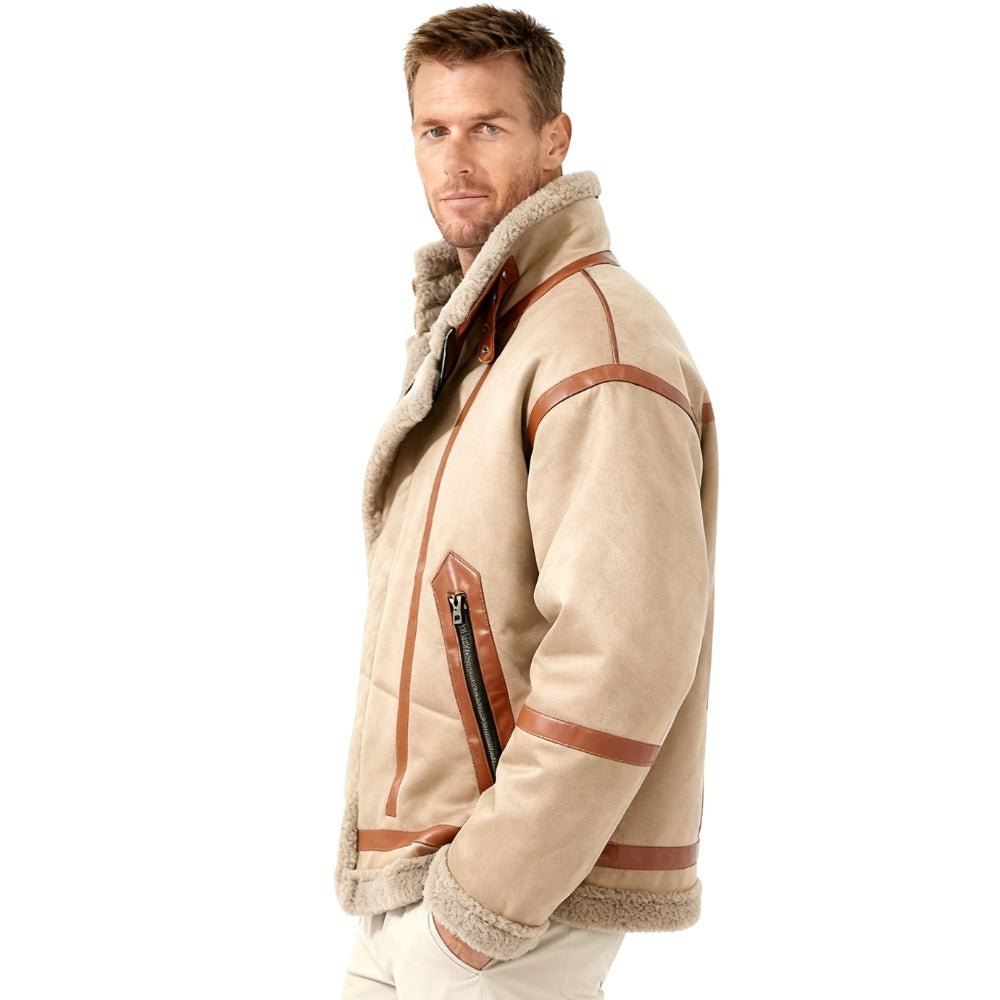 Man wearing a beige Kouvr jacket with brown accents on a white background
