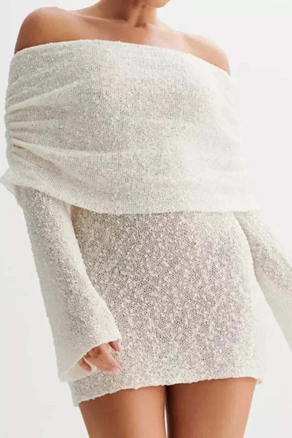 luxe knitwear', 'evening attire', 'sculptural silhouette', 'minimalist glamour', 'date night outfit', 'form-fitting', 'draped neckline
