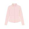 Woman wearing the Kouvr Sculpting Zip Jacket in Petal Pink against a white wall.