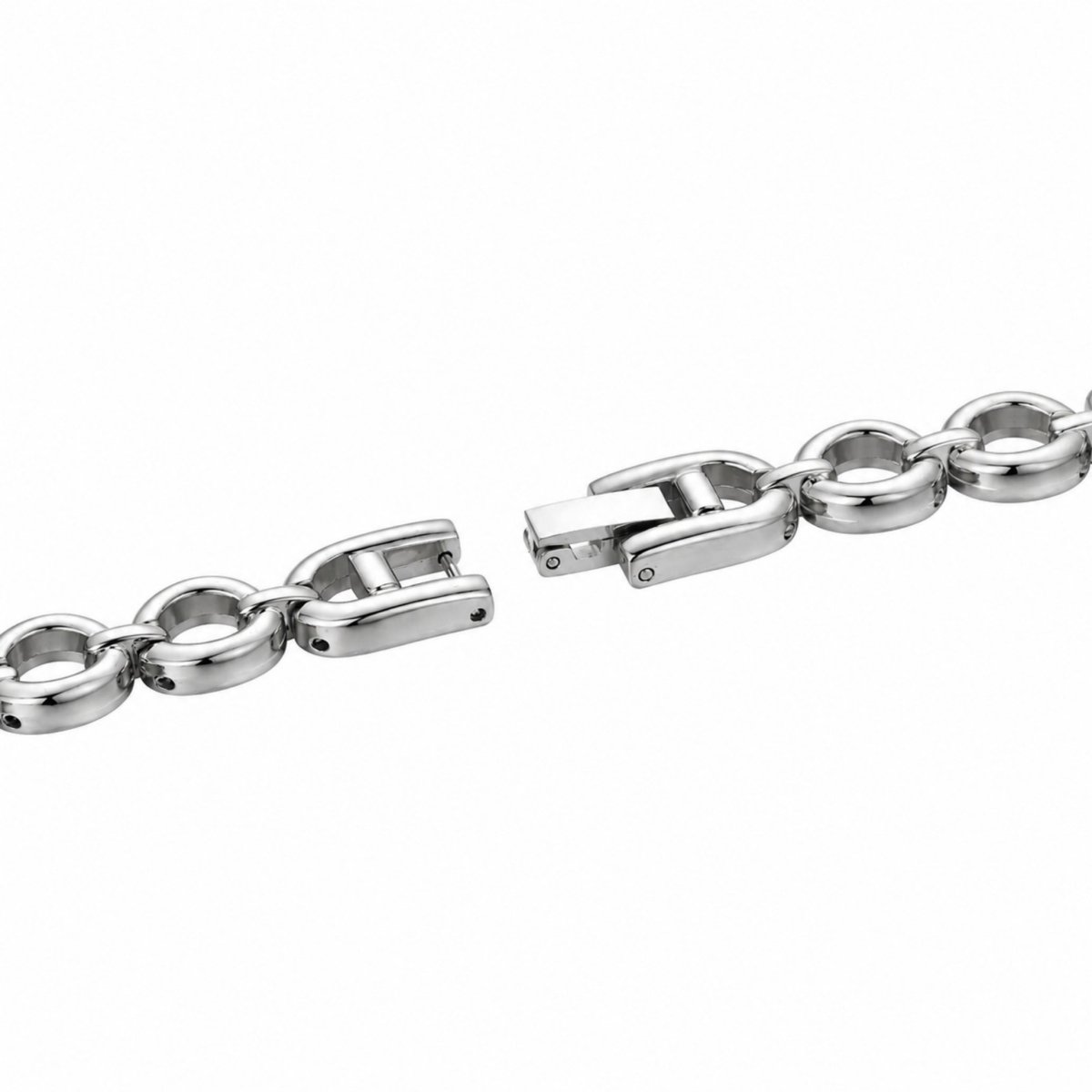 Macro detail showing the secure jewelry-style fold-over clasp on the silver Kouvr watch bracelet.