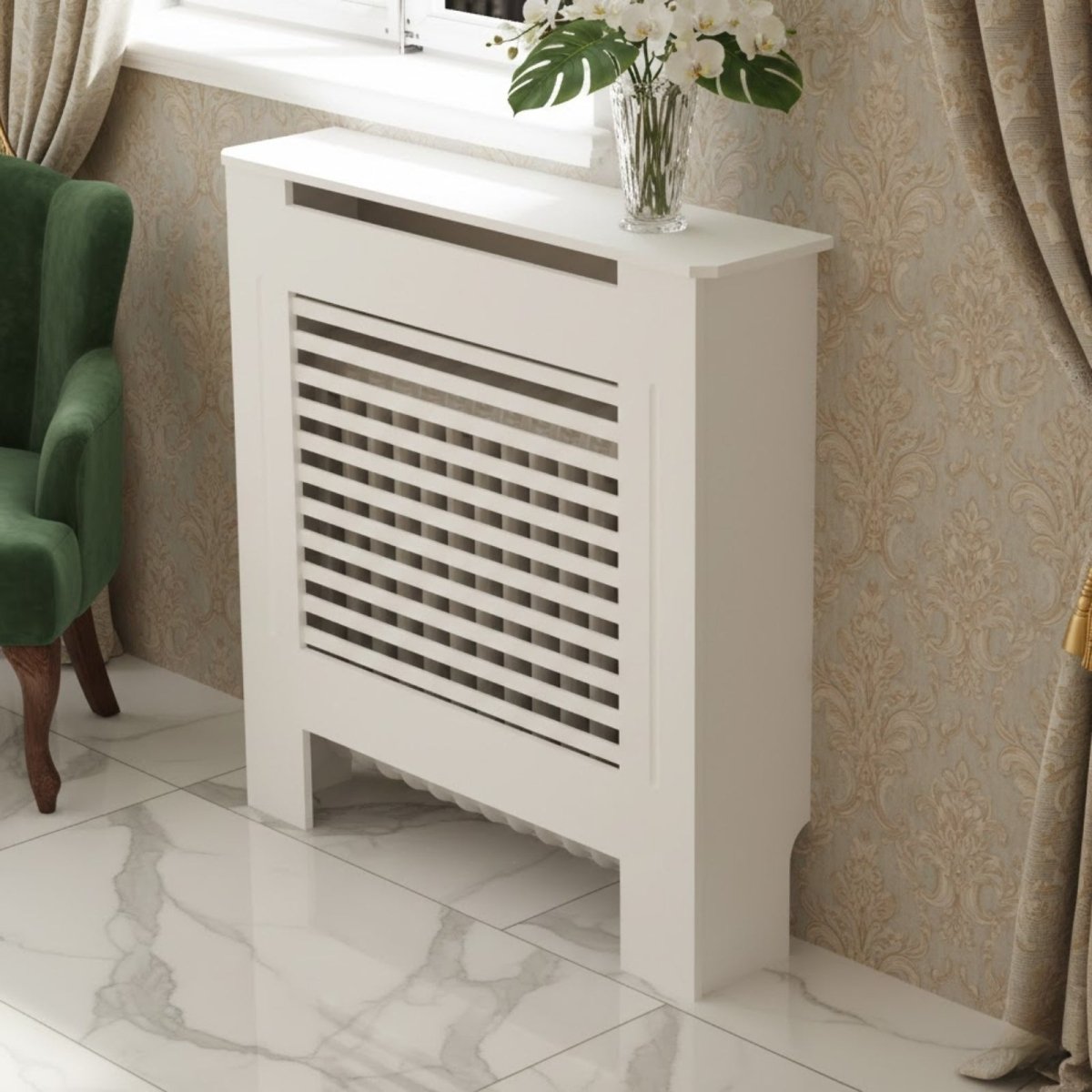 A small, narrow white radiator cover with a vertical slat orientation, positioned under a window next to a green armchair, serving as a compact shelf.
