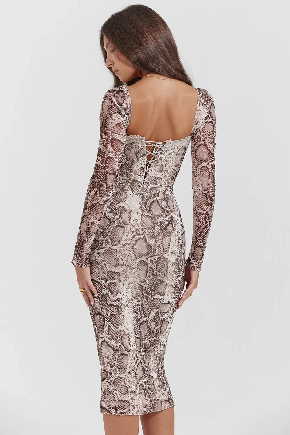 Weave these naturally into your product description: python print dress, square neckline dress, going out dress, date night outfit, mesh bodycon, fitted evening dress, brown animal print dress.