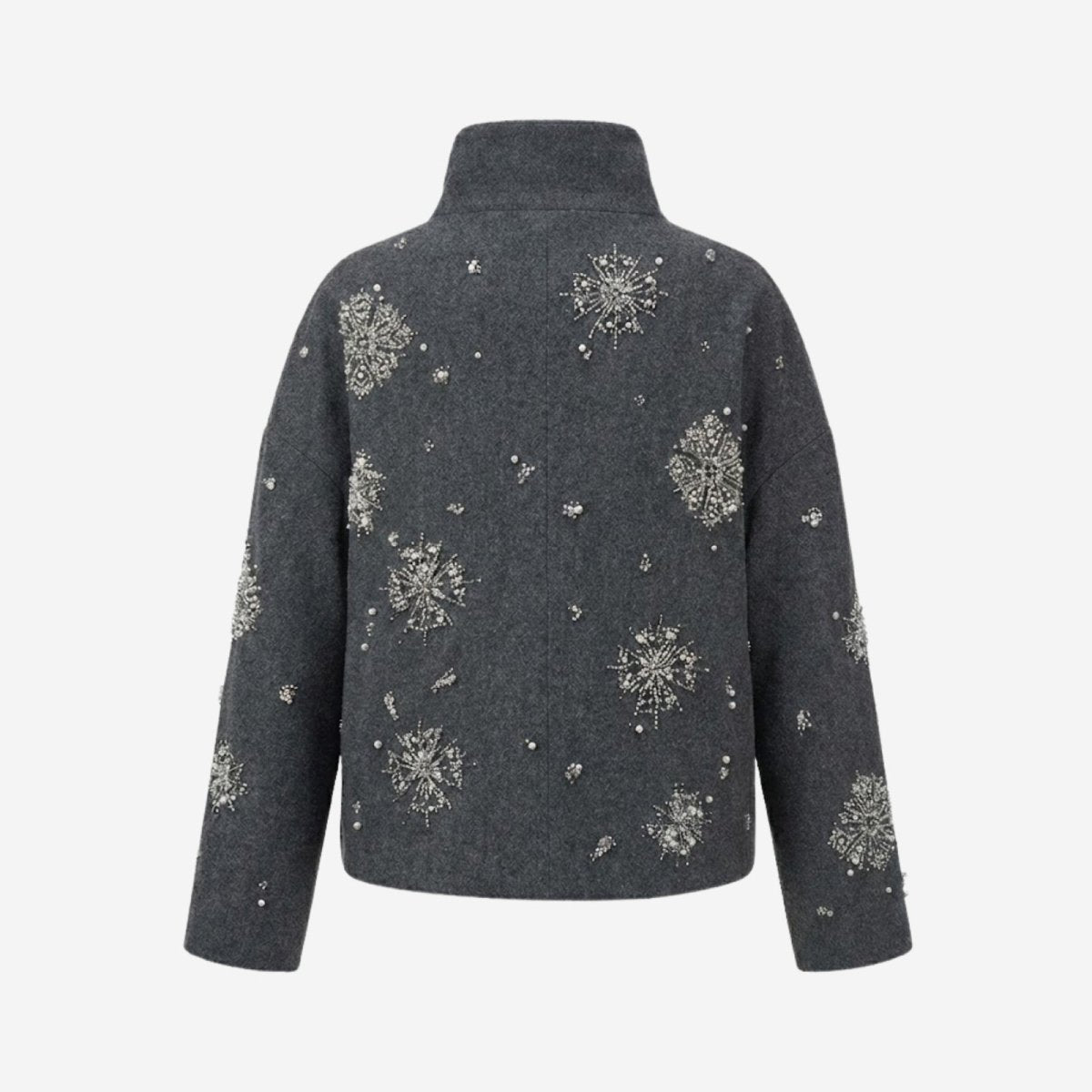 Flat product shot of the back of the Kouvr dark grey wool jacket, displaying the full spread of the embellished snowflake design.