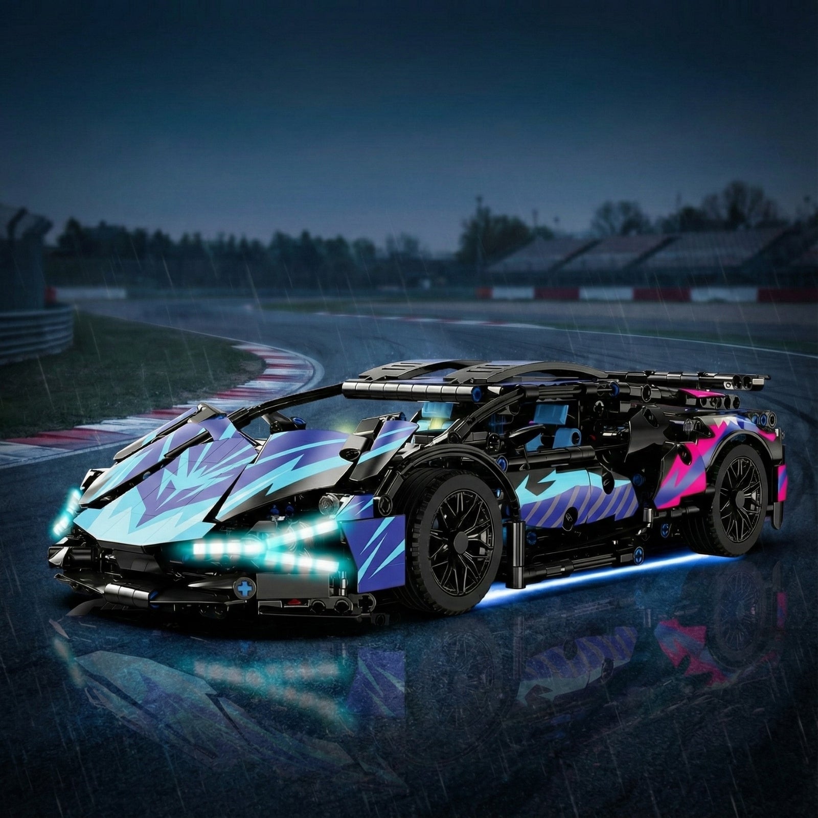 Front three-quarter view of the Kouvr Spectre Racer building block supercar on a wet racetrack at night, with its bright LED headlights and blue underglow illuminated.