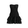 Model wearing Kouvr Starla black strapless smocked mini dress with tiered eyelet skirt