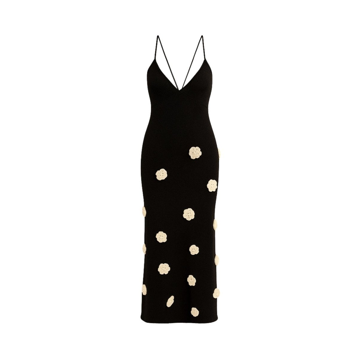 Black dress with white polka dots on a white background