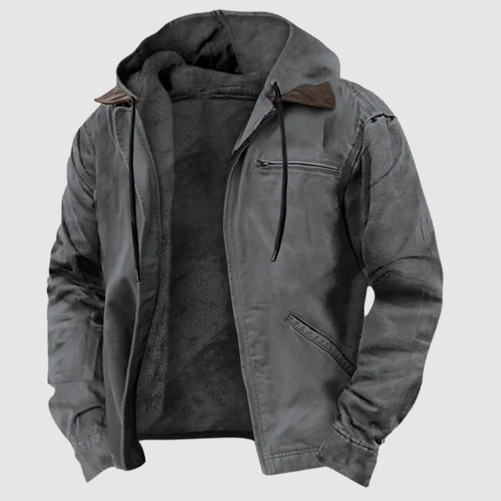 Close-up product view of the Kouvr Tyrian jacket in gray, showing the open zipper and plush black sherpa fleece lining.