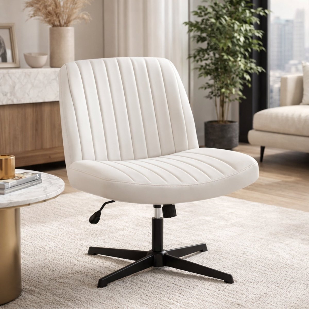Clean white fabric armless task chair showing relaxed cross-legged seating position capability.