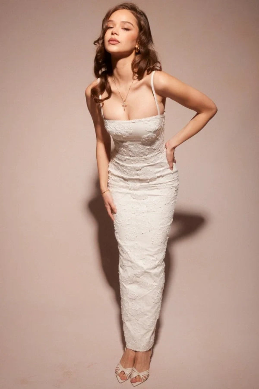 sculptural silhouette," "couture detailing," "ethereal elegance," "minimalist bride," "civil ceremony attire," and "rehearsal dinner outfit