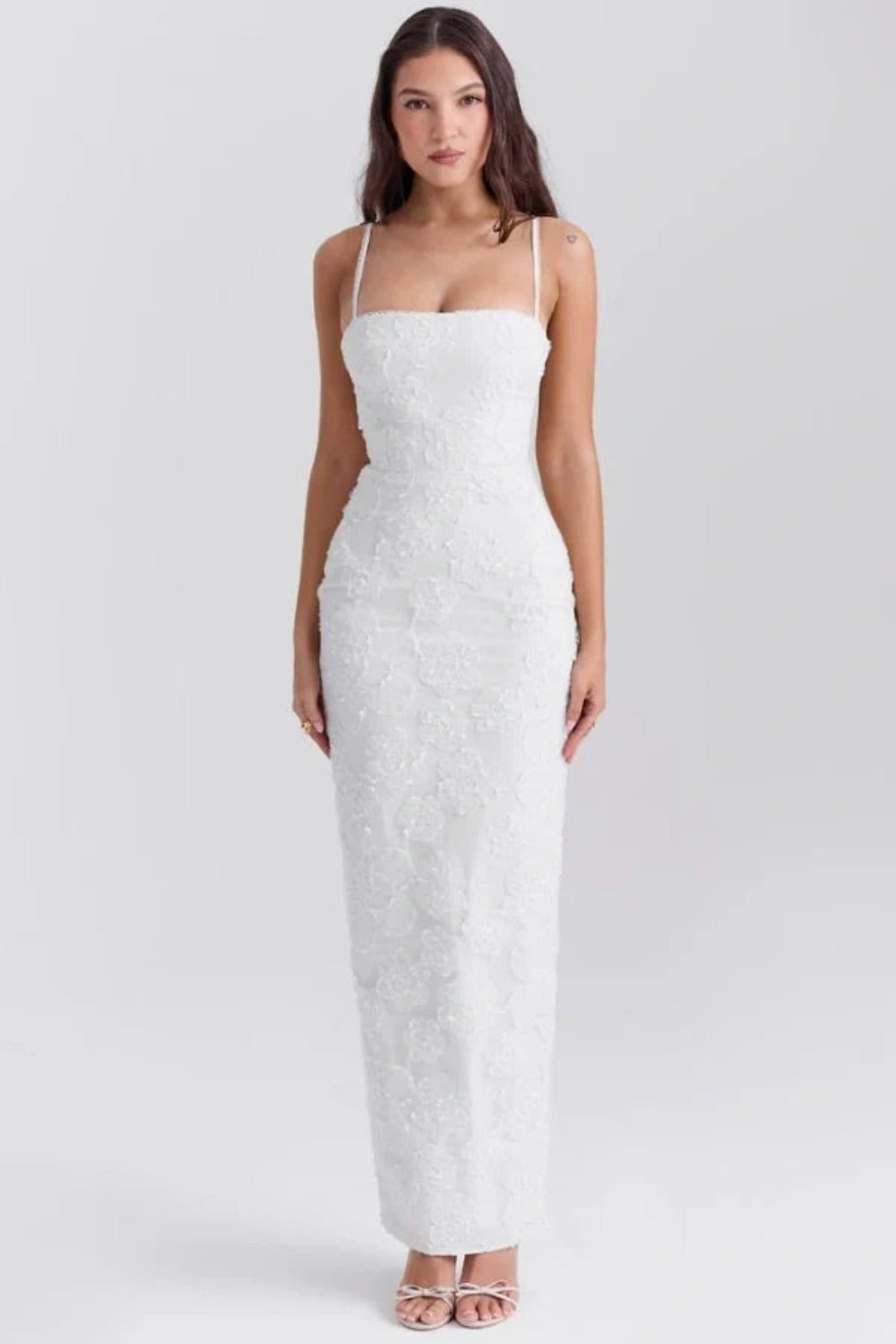 sculptural silhouette," "couture detailing," "ethereal elegance," "minimalist bride," "civil ceremony attire," and "rehearsal dinner outfit